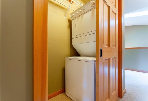 2-722 3Rd Street, Canmore, AB - Indoor Photo Showing Laundry Room