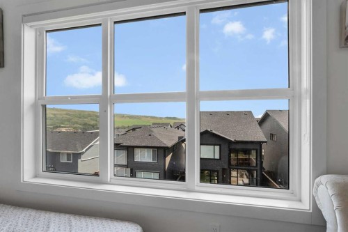 172 Precedence Hill, Cochrane, AB - Indoor Photo Showing Bedroom