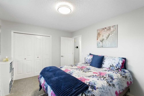 206 Mt Aberdeen Manor Se, Calgary, AB - Indoor Photo Showing Bedroom
