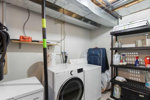 206 Mt Aberdeen Manor Se, Calgary, AB - Indoor Photo Showing Laundry Room