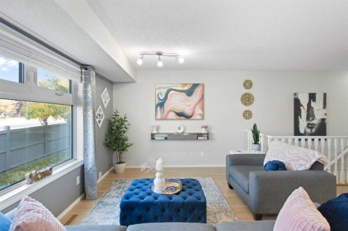 206 Mt Aberdeen Manor Se, Calgary, AB - Indoor Photo Showing Living Room