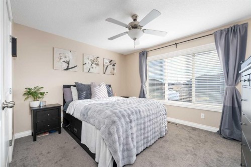 719 Hampton Hills Drive Ne, High River, AB - Indoor Photo Showing Bedroom