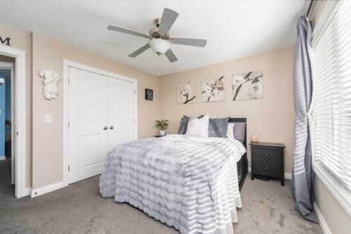 719 Hampton Hills Drive Ne, High River, AB - Indoor Photo Showing Bedroom