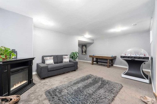 719 Hampton Hills Drive Ne, High River, AB - Indoor With Fireplace