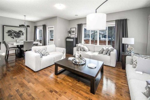 5 Panatella Square Nw, Calgary, AB - Indoor Photo Showing Living Room