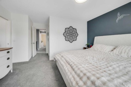 19 Marquis Gardens Se, Calgary, AB - Indoor Photo Showing Bedroom