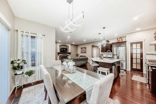 719 Panamount Boulevard Nw, Calgary, AB - Indoor Photo Showing Dining Room