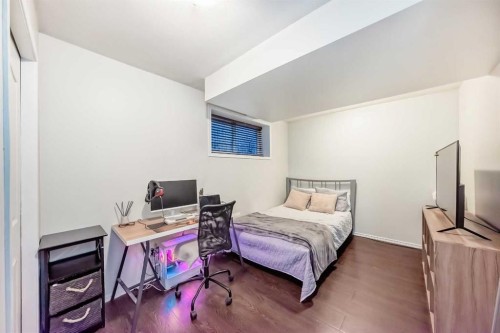 719 Panamount Boulevard Nw, Calgary, AB - Indoor Photo Showing Bedroom