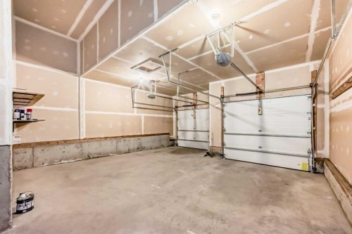 173 Aspenshire Drive Sw, Calgary, AB - Indoor Photo Showing Garage