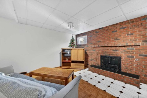 455 24 Avenue Ne, Calgary, AB - Indoor With Fireplace