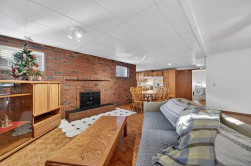 455 24 Avenue Ne, Calgary, AB - Indoor With Fireplace