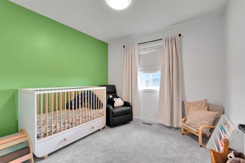 179 Willow Place, Cochrane, AB - Indoor Photo Showing Bedroom