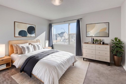 362 Wolf Creek Manor Se, Calgary, AB - Indoor Photo Showing Bedroom