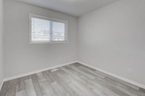 362 Wolf Creek Manor Se, Calgary, AB - Indoor Photo Showing Other Room