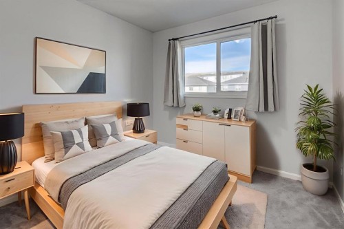 362 Wolf Creek Manor Se, Calgary, AB - Indoor Photo Showing Bedroom