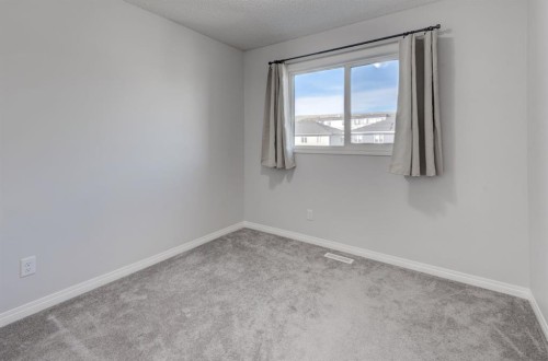 362 Wolf Creek Manor Se, Calgary, AB - Indoor Photo Showing Other Room