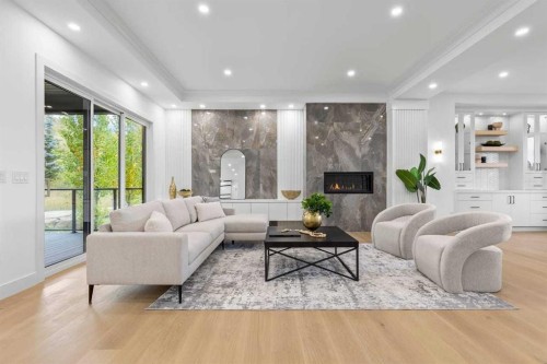 407 Patterson Boulevard Sw, Calgary, AB - Indoor Photo Showing Living Room With Fireplace