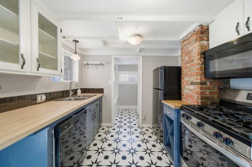 1529 27 Avenue Sw, Calgary, AB - Indoor Photo Showing Kitchen With Double Sink