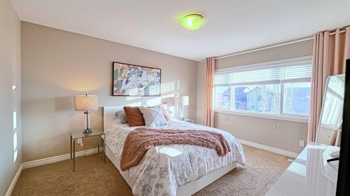 12 Legacy Gate Se, Calgary, AB - Indoor Photo Showing Bedroom