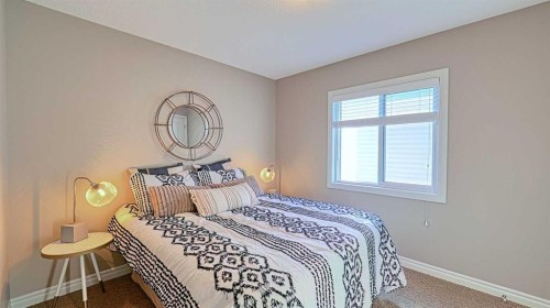 12 Legacy Gate Se, Calgary, AB - Indoor Photo Showing Bedroom
