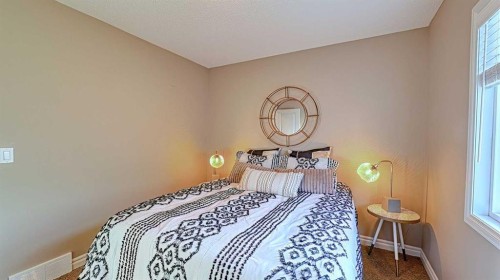 12 Legacy Gate Se, Calgary, AB - Indoor Photo Showing Bedroom