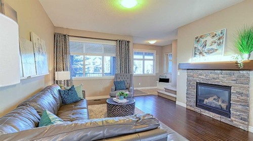 12 Legacy Gate Se, Calgary, AB - Indoor Photo Showing Living Room With Fireplace