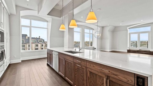 502-221 Quarry Way Se, Calgary, AB - Indoor Photo Showing Kitchen With Upgraded Kitchen