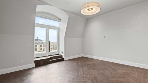 502-221 Quarry Way Se, Calgary, AB - Indoor Photo Showing Other Room