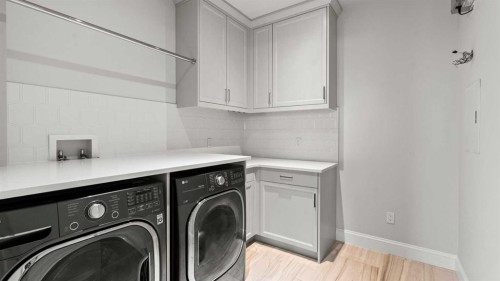 502-221 Quarry Way Se, Calgary, AB - Indoor Photo Showing Laundry Room