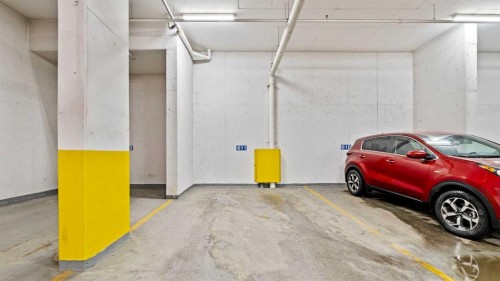 502-221 Quarry Way Se, Calgary, AB - Indoor Photo Showing Garage
