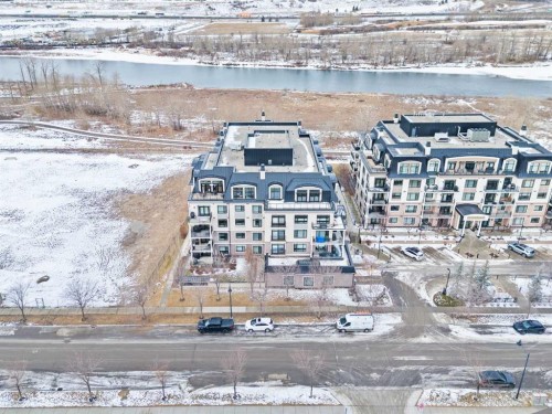502-221 Quarry Way Se, Calgary, AB - Outdoor With Body Of Water With View