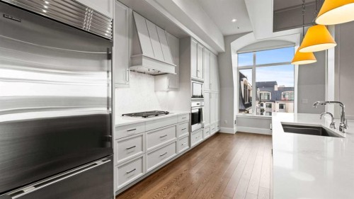 502-221 Quarry Way Se, Calgary, AB - Indoor Photo Showing Kitchen With Upgraded Kitchen