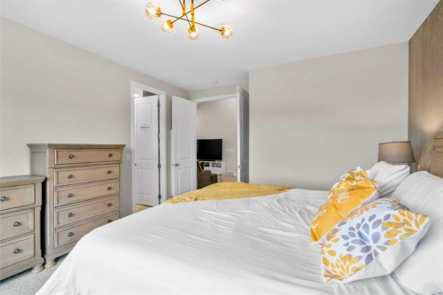 29 Magnolia Manor Se, Calgary, AB - Indoor Photo Showing Bedroom