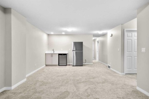 29 Magnolia Manor Se, Calgary, AB - Indoor Photo Showing Other Room
