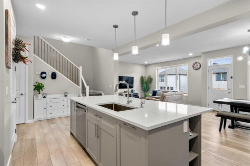 29 Magnolia Manor Se, Calgary, AB - Indoor Photo Showing Kitchen With Upgraded Kitchen