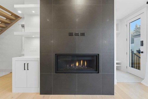 631 55 Avenue Sw, Calgary, AB - Indoor With Fireplace
