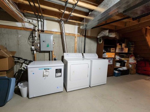 9 Country Hills Rise Nw, Calgary, AB - Indoor Photo Showing Laundry Room