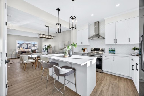355 Fireside Drive Nw, Cochrane, AB - Indoor Photo Showing Kitchen With Upgraded Kitchen