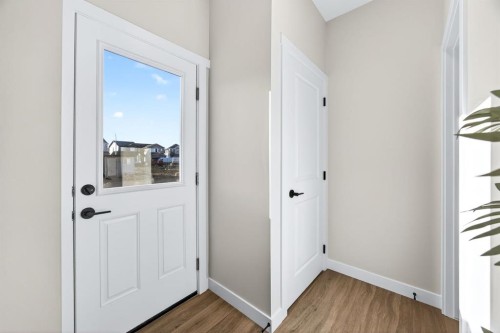 355 Fireside Drive Nw, Cochrane, AB - Indoor Photo Showing Other Room