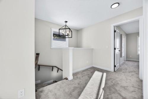 355 Fireside Drive Nw, Cochrane, AB - Indoor Photo Showing Other Room