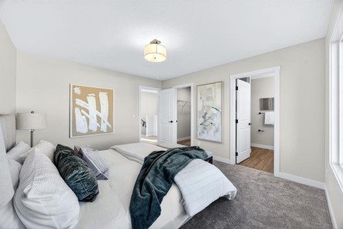 355 Fireside Drive Nw, Cochrane, AB - Indoor Photo Showing Bedroom