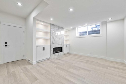 1417 42 Street Sw, Calgary, AB - Indoor Photo Showing Other Room With Fireplace