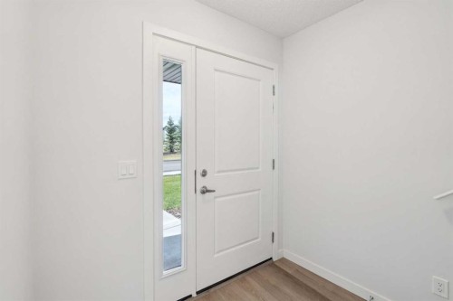 54 Evanscrest Manor Nw, Calgary, AB - Indoor Photo Showing Other Room