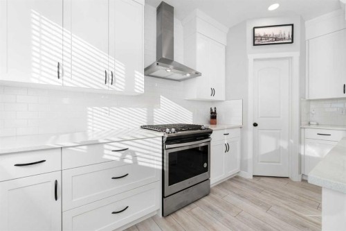 141 Boulder Creek Place, Langdon, AB - Indoor Photo Showing Kitchen With Upgraded Kitchen
