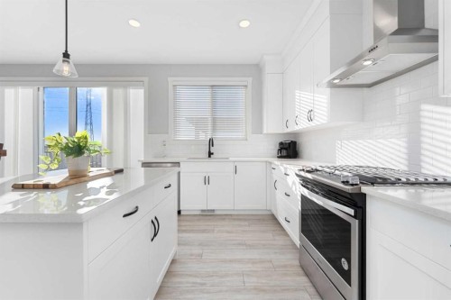141 Boulder Creek Place, Langdon, AB - Indoor Photo Showing Kitchen With Upgraded Kitchen