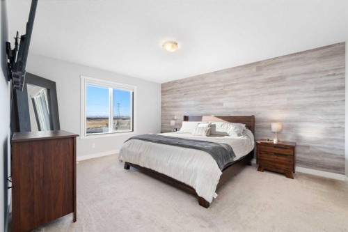141 Boulder Creek Place, Langdon, AB - Indoor Photo Showing Bedroom