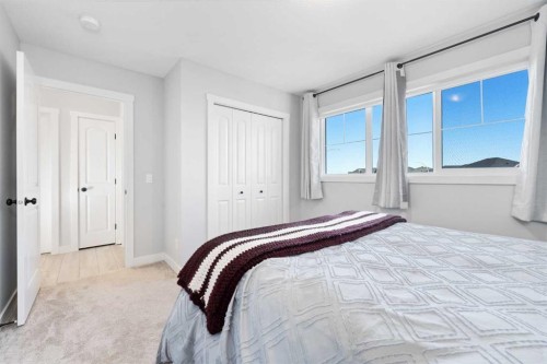 141 Boulder Creek Place, Langdon, AB - Indoor Photo Showing Bedroom