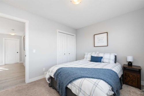 141 Boulder Creek Place, Langdon, AB - Indoor Photo Showing Bedroom