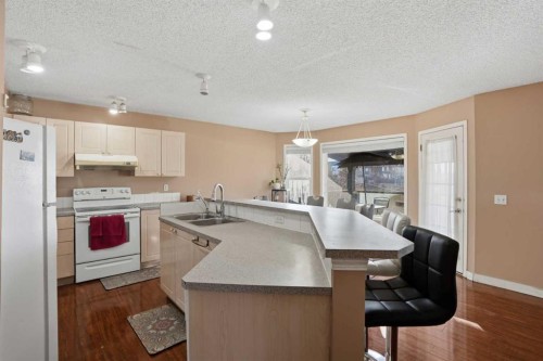 82 Martha'S Meadow Close Ne, Calgary, AB - Indoor Photo Showing Kitchen With Double Sink