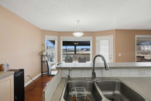 82 Martha'S Meadow Close Ne, Calgary, AB - Indoor Photo Showing Kitchen With Double Sink